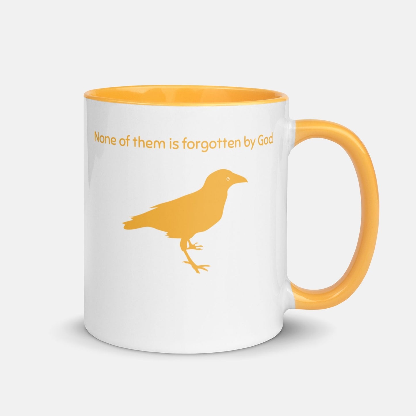 'Consider the Ravens' - golden yellow mug