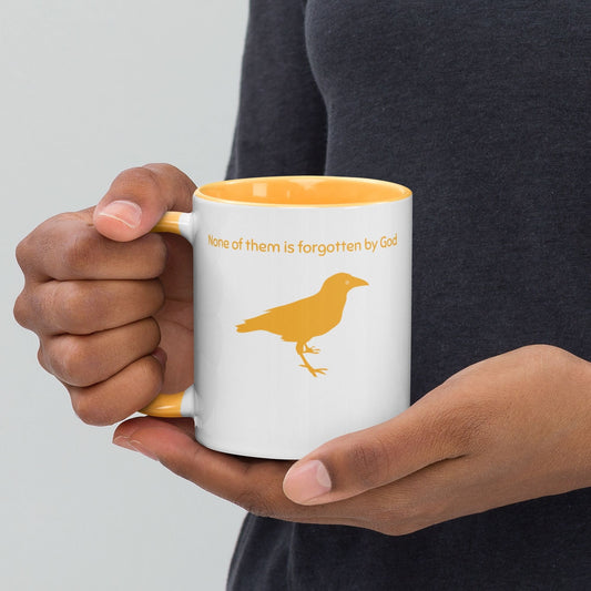'Consider the Ravens' - golden yellow mug